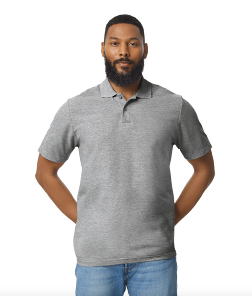 Man wearing a gray polo shirt and blue jeans on a white background