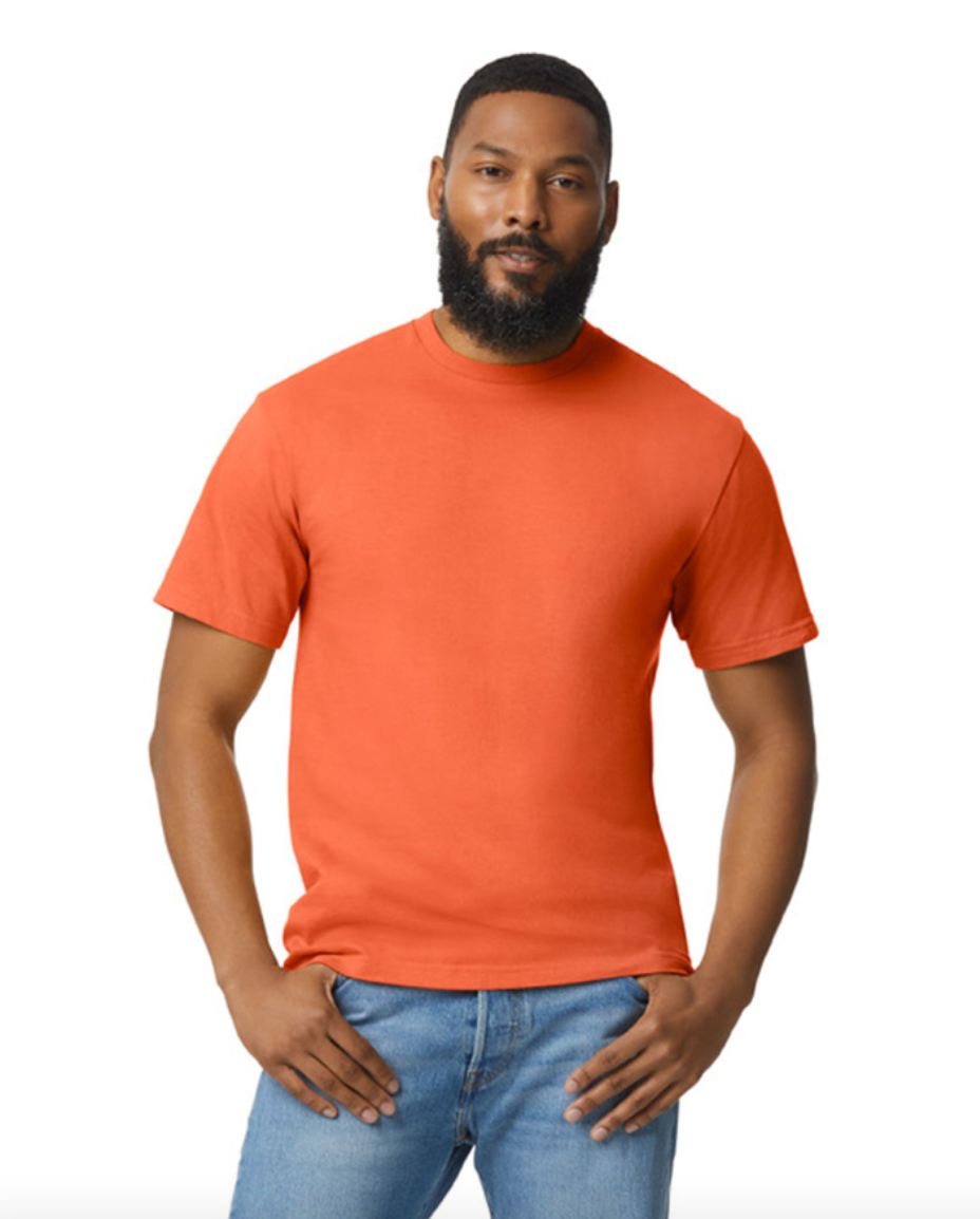 Man wearing an orange t-shirt and blue jeans on a white background