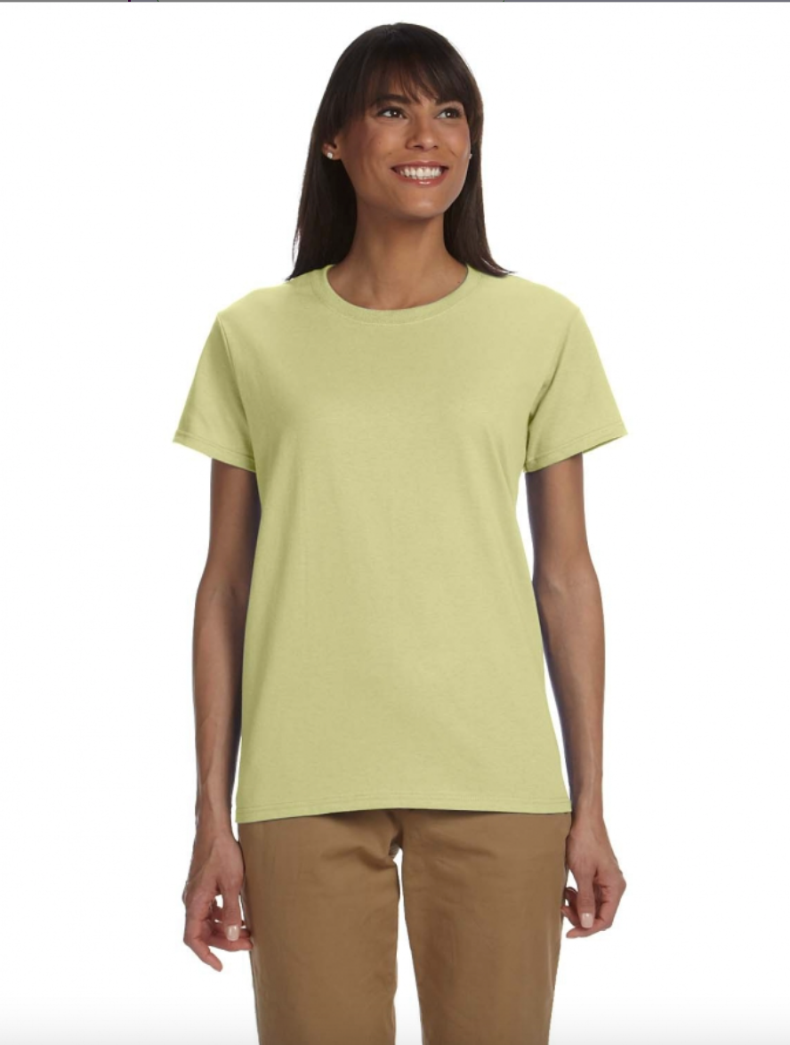 Woman wearing a light green t-shirt and brown pants on a white background