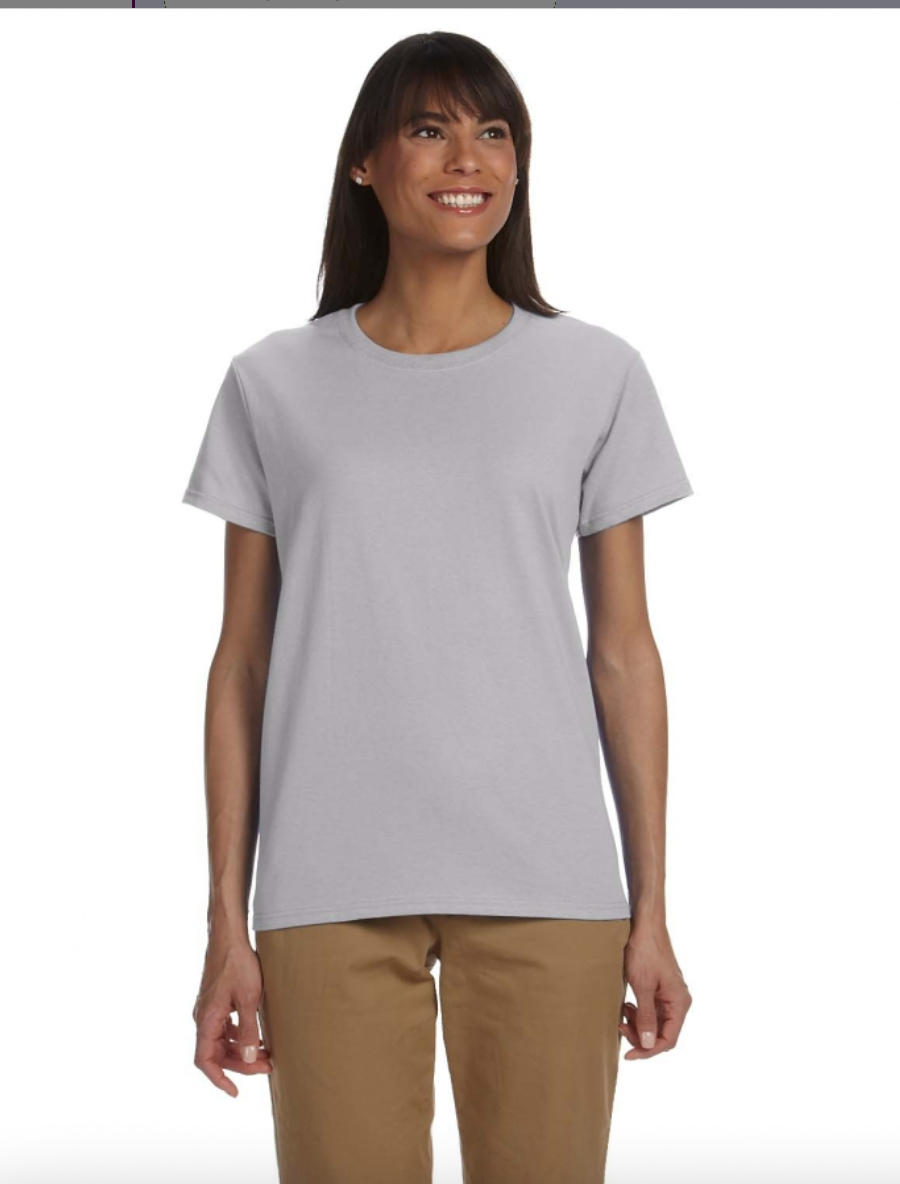 Woman wearing a gray t-shirt and brown pants on a white background