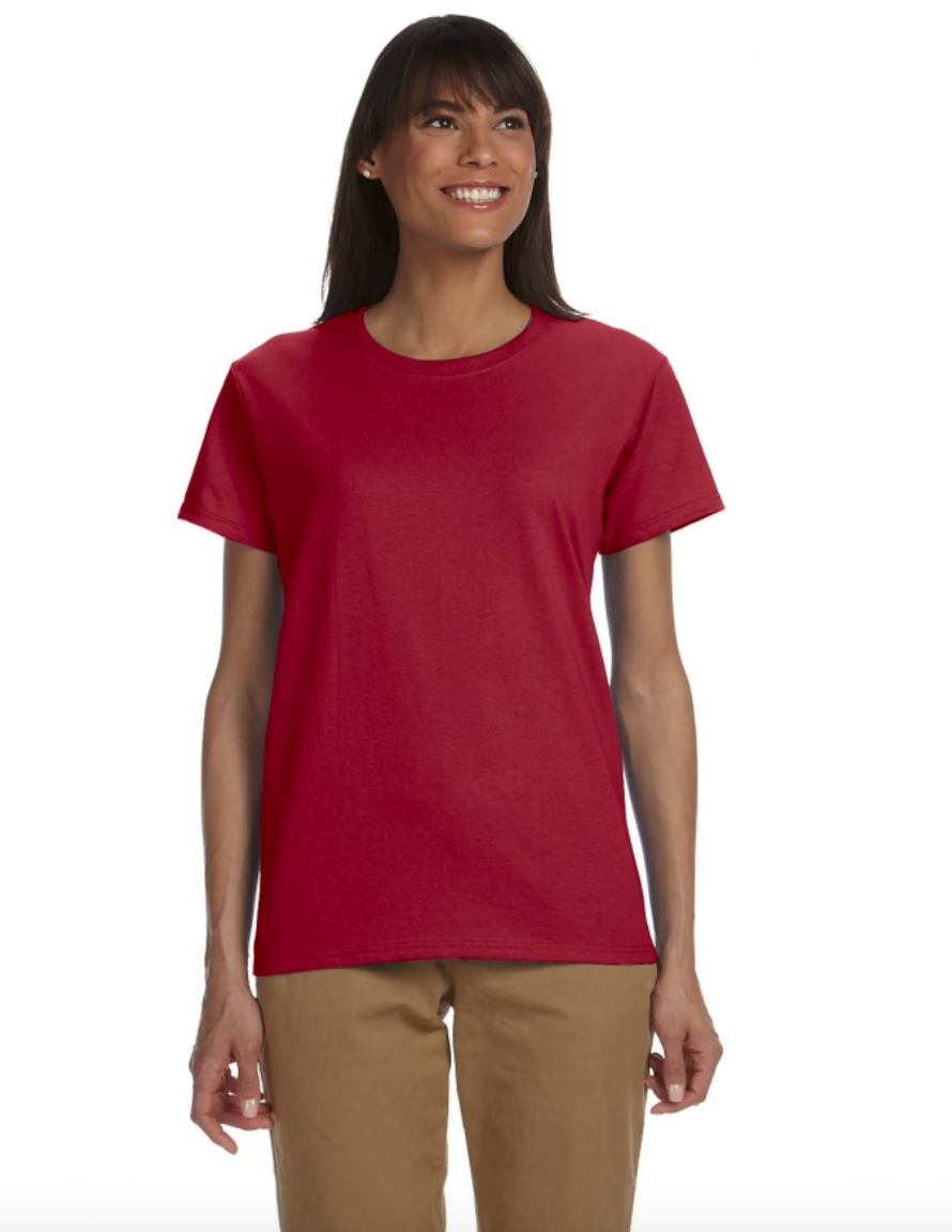 Woman wearing a red t-shirt and beige pants on a white background
