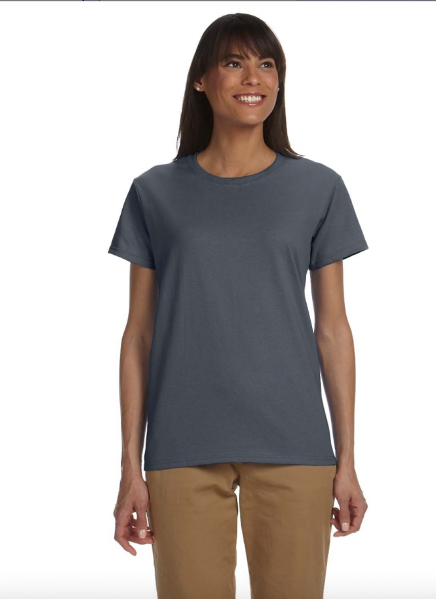 Woman wearing a gray t-shirt and brown pants on a white background