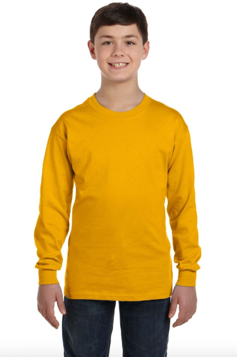 Child wearing a mustard yellow long-sleeve shirt on a white background