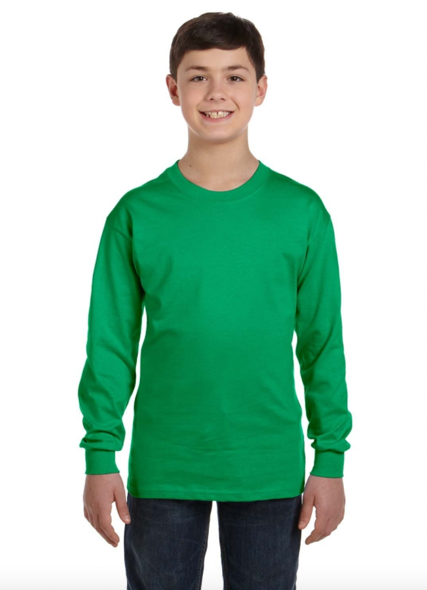 Young boy wearing a green long-sleeve shirt on a white background