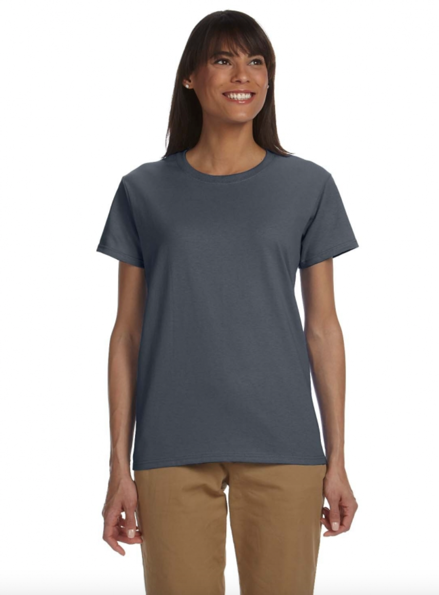 Woman wearing a gray t-shirt and brown pants on a white background