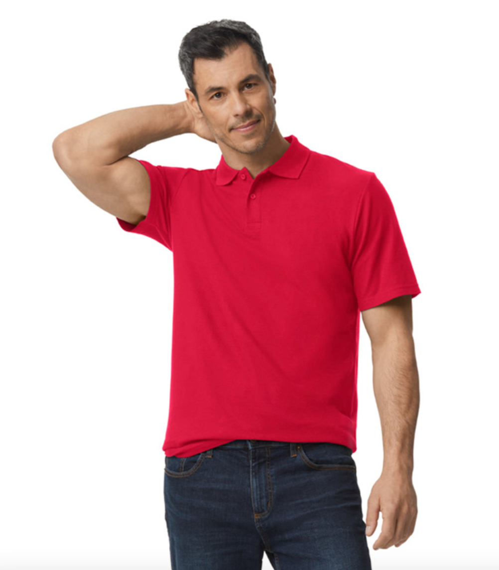 Man wearing a red polo shirt and blue jeans on a white background