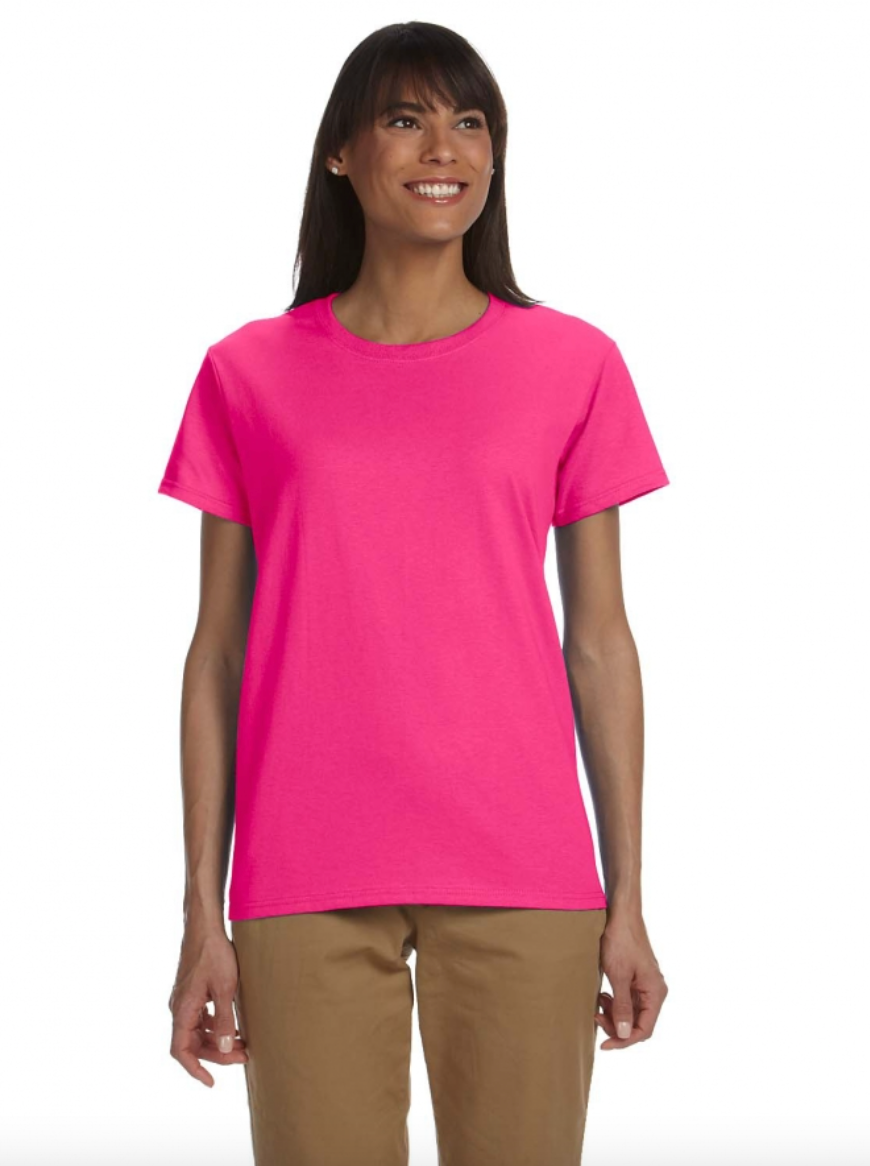 Woman wearing a bright pink t-shirt on a white background
