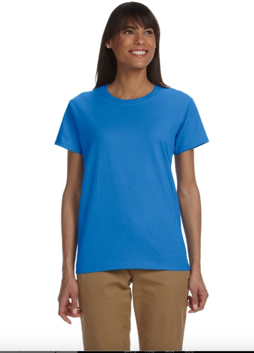 Woman wearing a blue t-shirt and brown pants on a white background