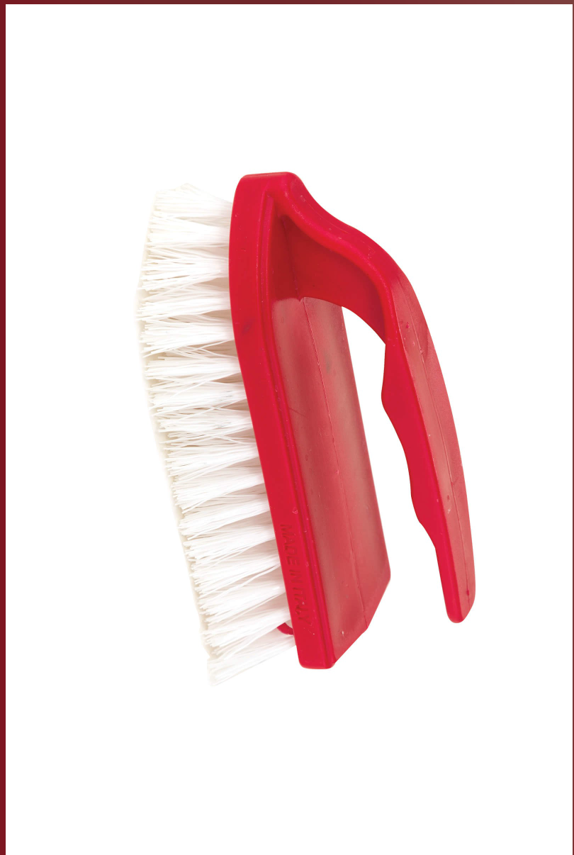 Red brush with white bristles on a white background