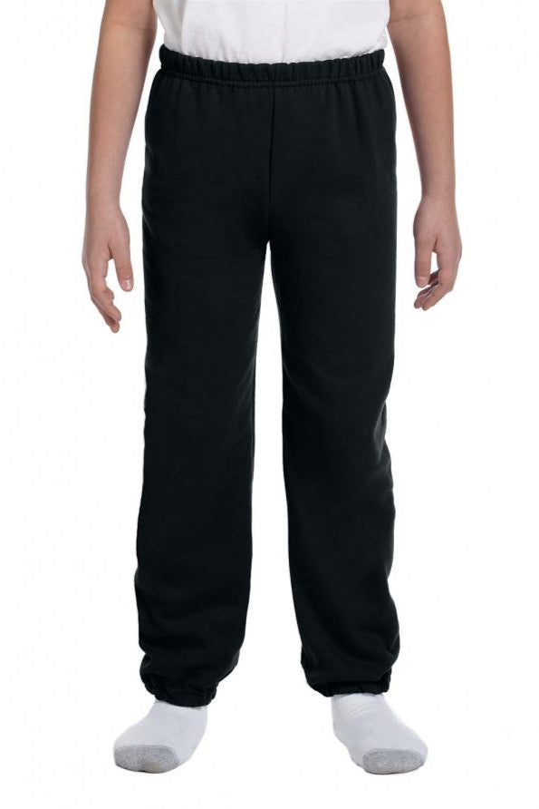 Person wearing black pants on a white background