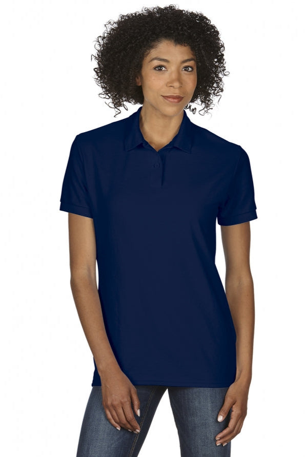 Person wearing a navy blue polo shirt on a white background