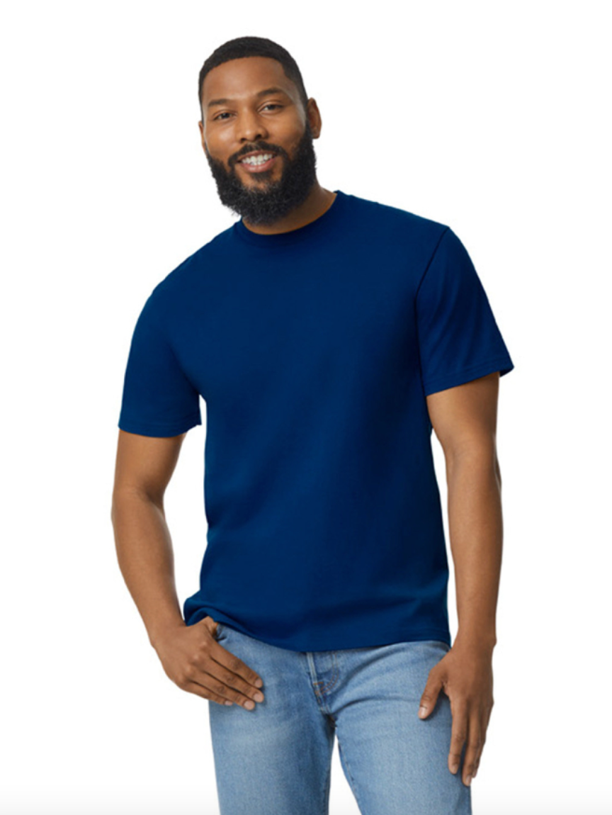 Man wearing a blue t-shirt and jeans on a white background