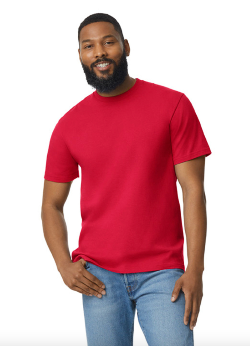 Man wearing a red t-shirt and blue jeans on a white background