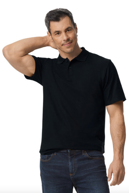 Man wearing a black polo shirt and blue jeans on a white background