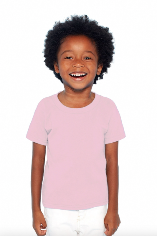Child wearing a light pink t-shirt on a white background