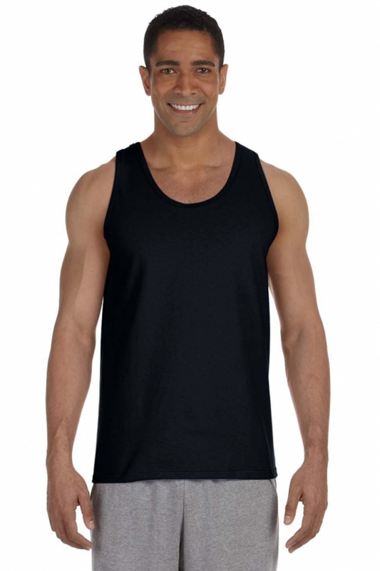 Man wearing a black tank top and gray shorts on a white background