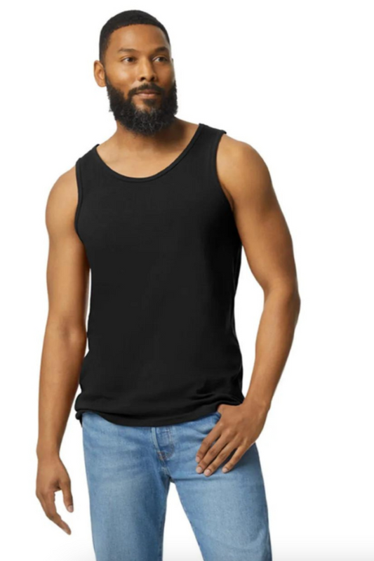 Man wearing a black tank top and light blue jeans on a white background