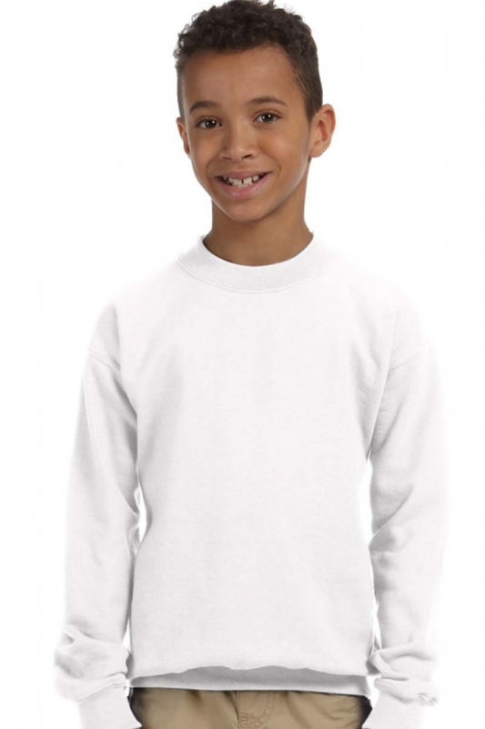 Child wearing a white long-sleeve shirt and beige pants on a white background