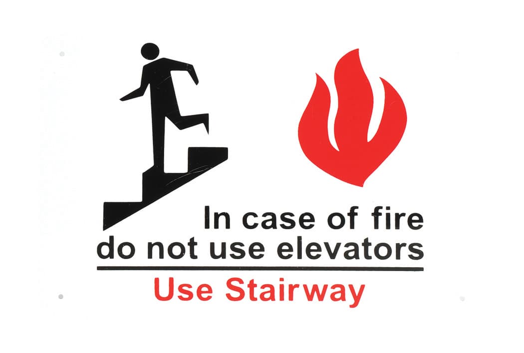 SIGN IN CASE OF FIRE USE STAIR
