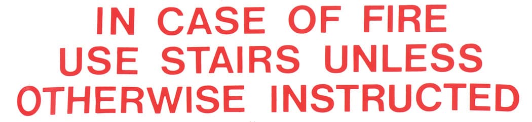 SIGN IN CASE OF FIRE USE STAIR