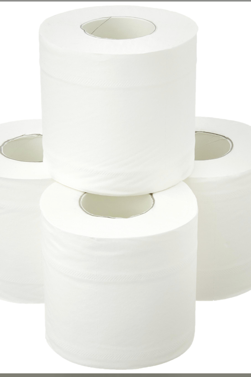 Four rolls of white toilet paper stacked on a gray background