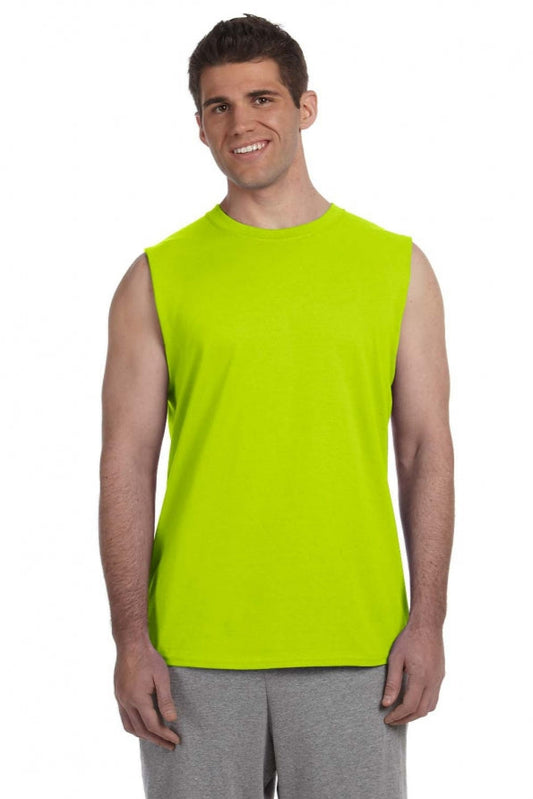 Man wearing a bright green sleeveless shirt on a white background