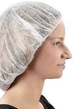 Person wearing a white hairnet